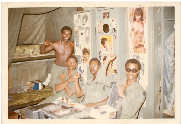 Jean Bell Playboy centerfold on barracks wall by Unknown