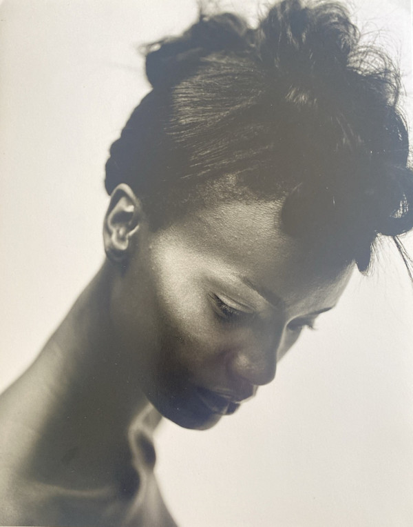 Model looking down by Unknown