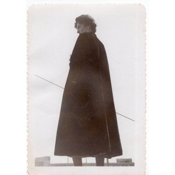 Woman modeling long coat, Atlantic City by Unknown