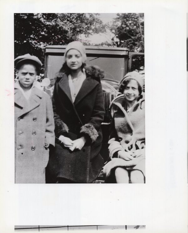 John, Elsie (1914 - 1949), and Virginia Roxborough by their house at 608 Woodland, Detroit by Unknown