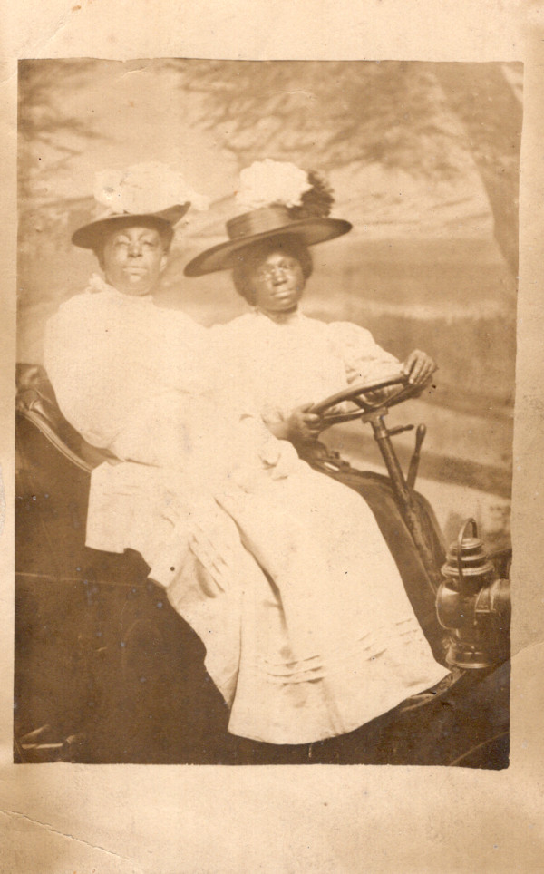 Two women in prop car by Unknown