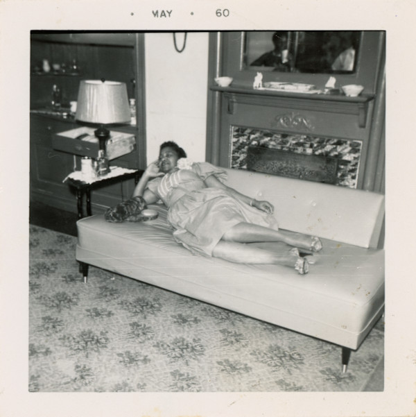 Mrs. Annie B. Allen reclining on sofa by Unknown