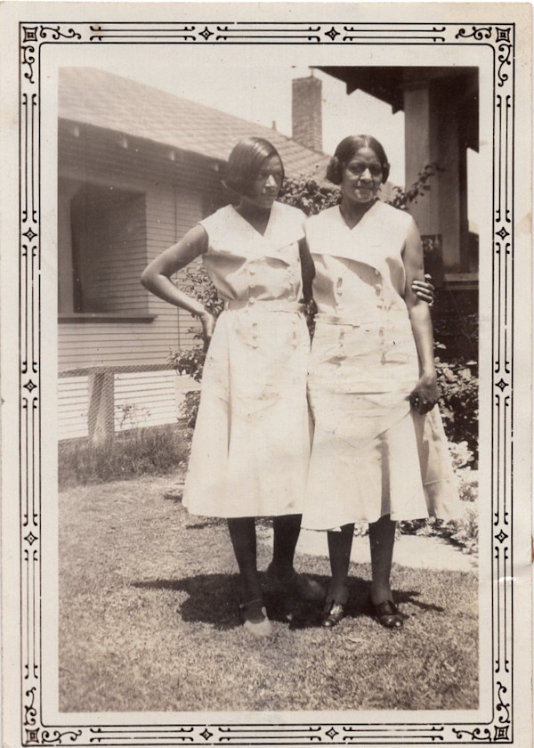 Net & Prudie on 48th Place (mother & daughter dressed alike) by Unknown