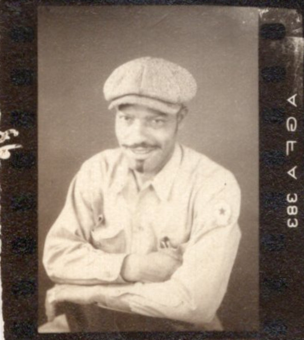Soldier in uniform and apple cap by Unknown