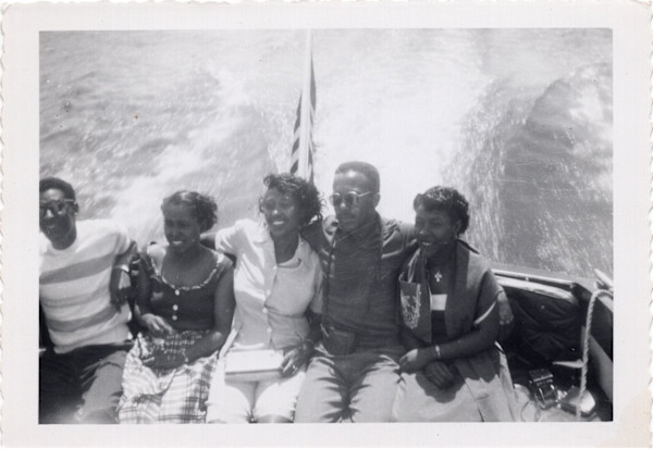 Five on a boat by Unknown