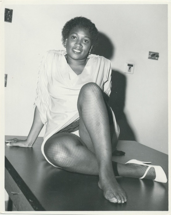 Cheesecake model (table mat; one shoe off) by Unknown