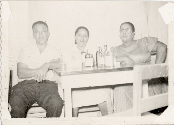 Trio having drinks, Lake Charles, Louisiana by Unknown