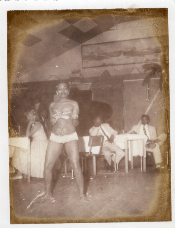 Burlesque dancer in floor show by Unknown