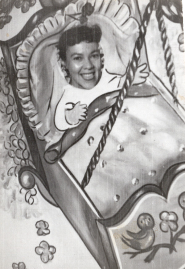 Girl in crib by Unknown