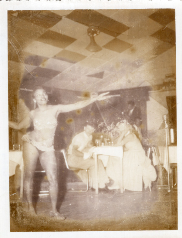 Burlesque dancer in floor show by Unknown
