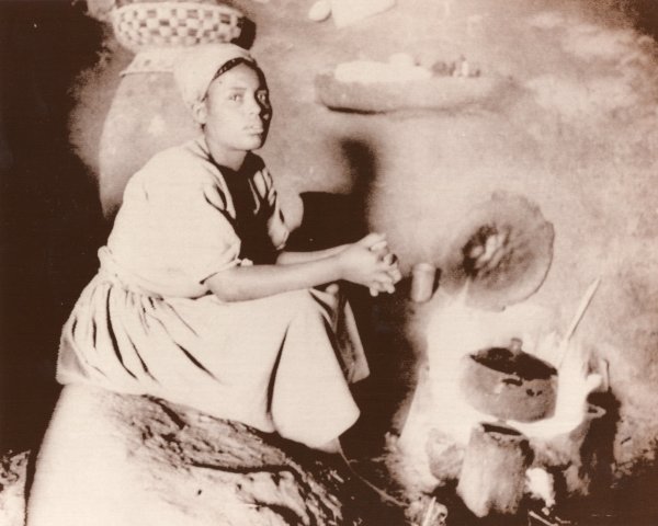 Woman making coffee, Ethiopia by Unknown