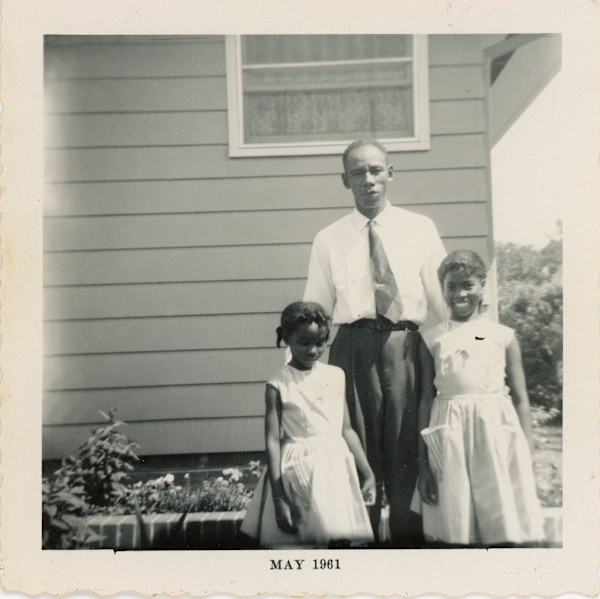 Man and two girls by Unknown