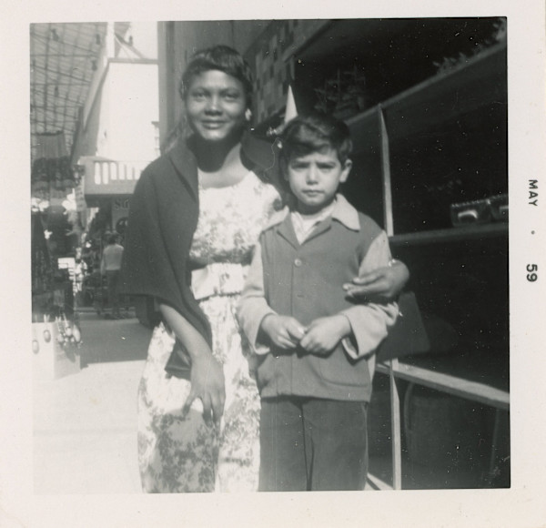 Woman with boy by Unknown