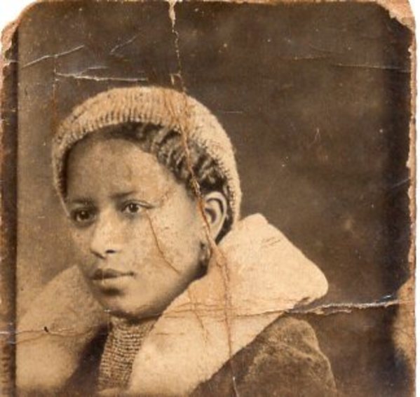 Gem miniature of woman in fur collar by Unknown