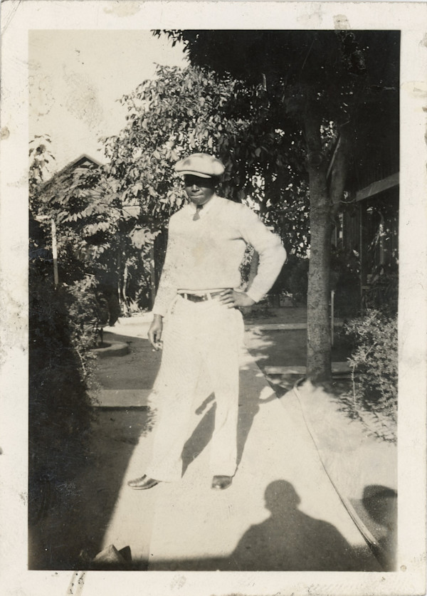 Man with photographer’s shadow by Unknown