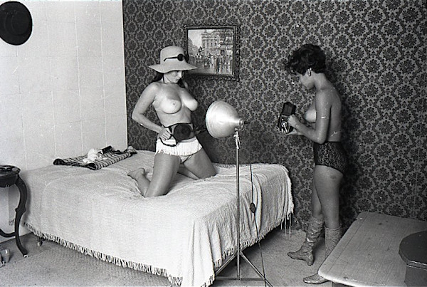 Pinup photographing other pinup by Unknown