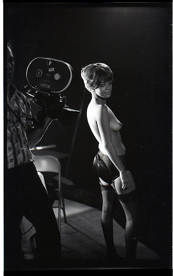 Topless dancer being filmed by Unknown