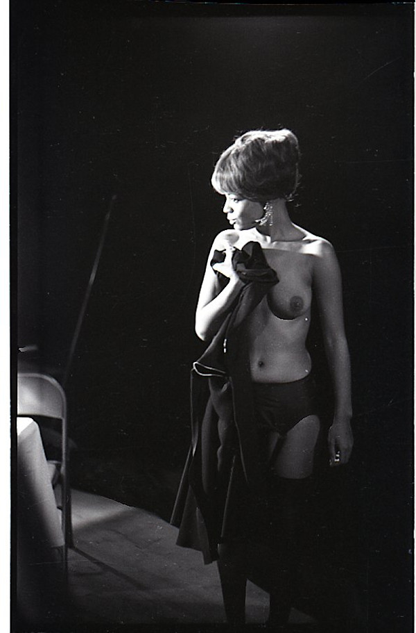 Topless dancer being filmed by Unknown