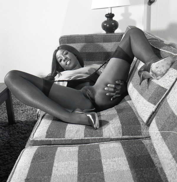 Pinup #123.N2 (checkered sofa) by Unknown