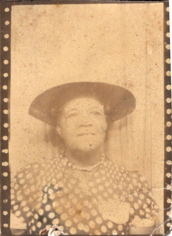 Woman in polka dot dress by Unknown