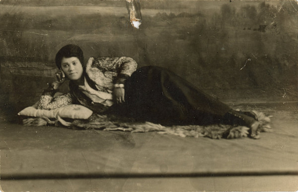 Reclining woman by Unknown