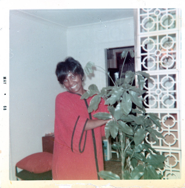 Woman in red caftan by Unknown