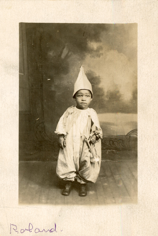 Roland in costume holding horn by Unknown