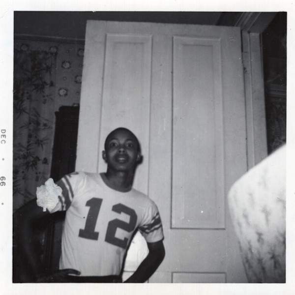 Young man in #12 jersey by Unknown