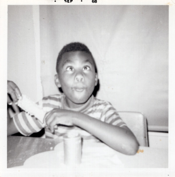 Boy making a silly face by Unknown