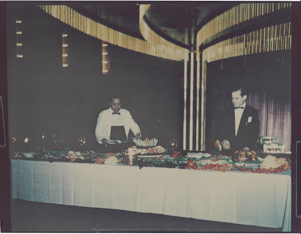 Server at buffet by Unknown