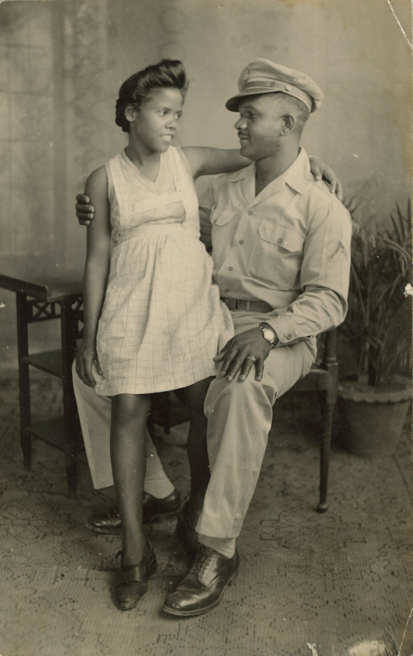 Soldier with his pregnant wife by Unknown