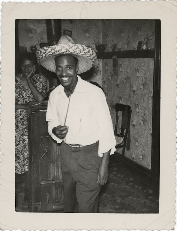 Man in sombrero by Unknown