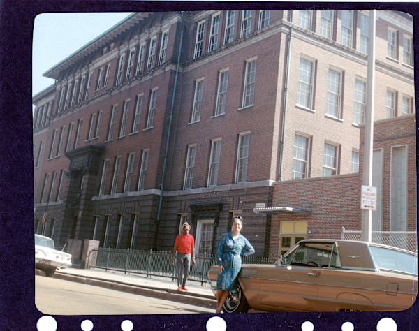 Martha & Louis in front of Marshall School, 7501 Maryland Avenue, St. Louis by Unknown
