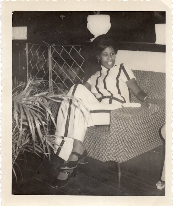 Woman in striped jumpsuit by Unknown