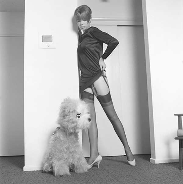Pinup with stuffed dog by Unknown