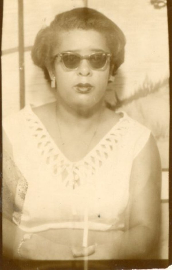 Woman in sunglasses by Unknown