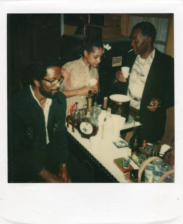 Trio at home bar by Unknown