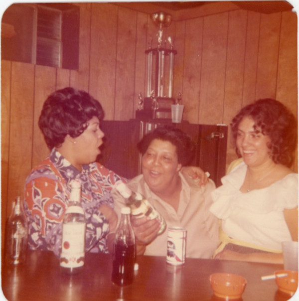 Three women drinking by Unknown
