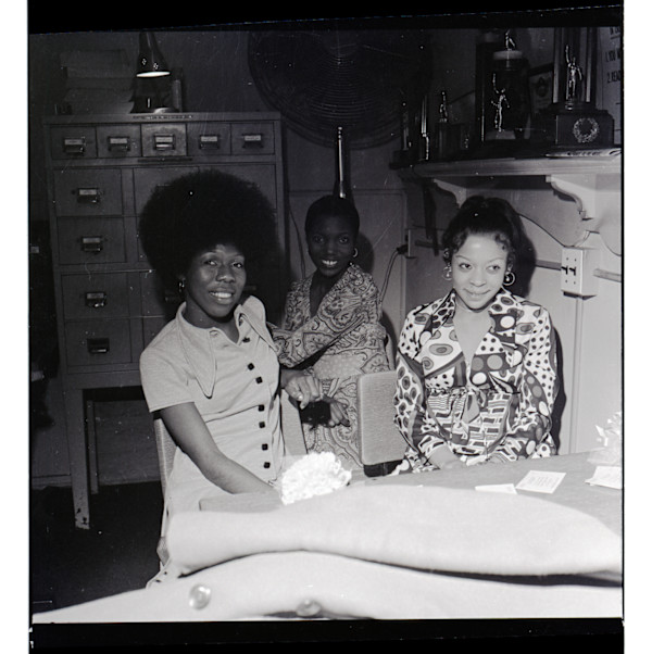 Three women in office by Unknown