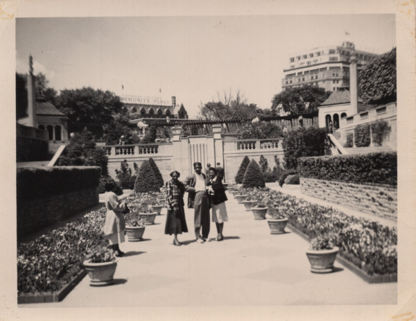 Trio in a garden by Unknown