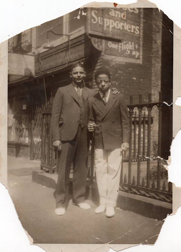 Sharp-dressed father and son in white shoes by Unknown
