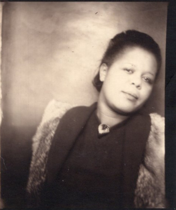 Woman leaning to her left by Unknown