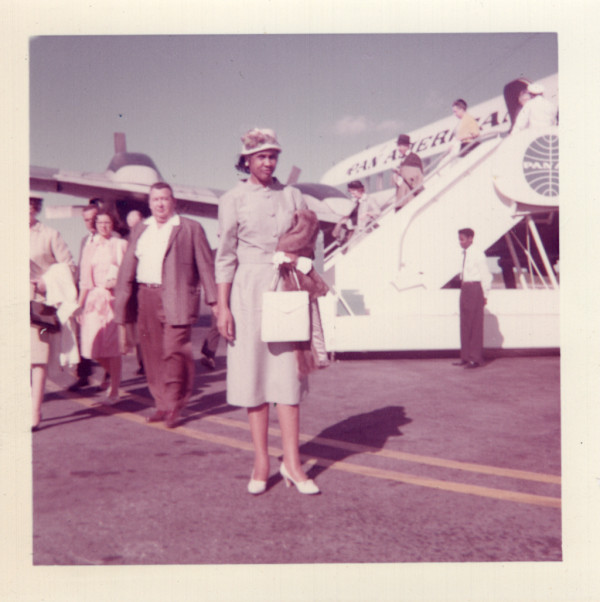 Woman by Pan Am plane by Unknown