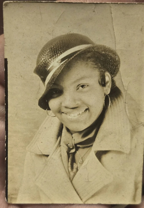 Woman in rakish hat by Unknown