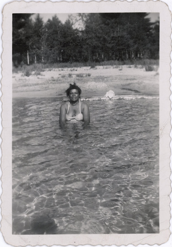Woman in a lake by Unknown