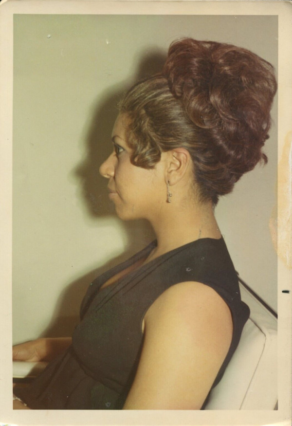 Woman wearing hair attachment by Unknown