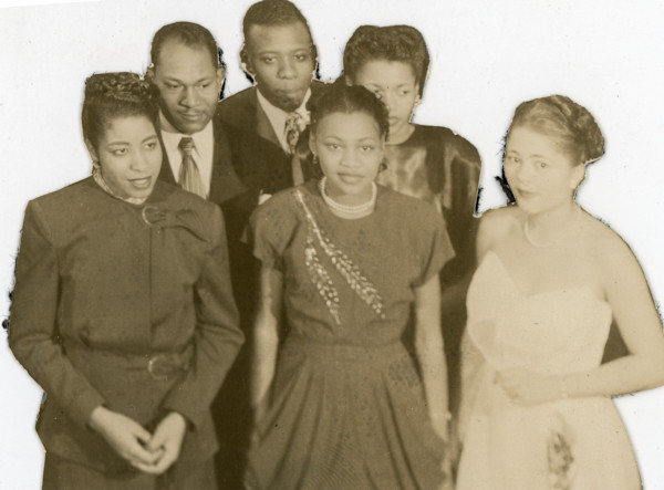 Cutout of a group of friends by Unknown