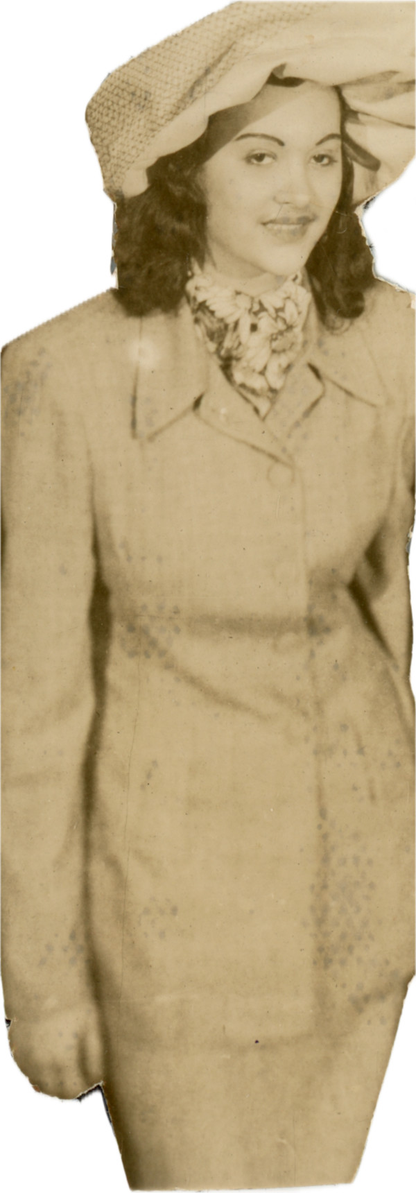Cutout of woman in suit and hat by Unknown