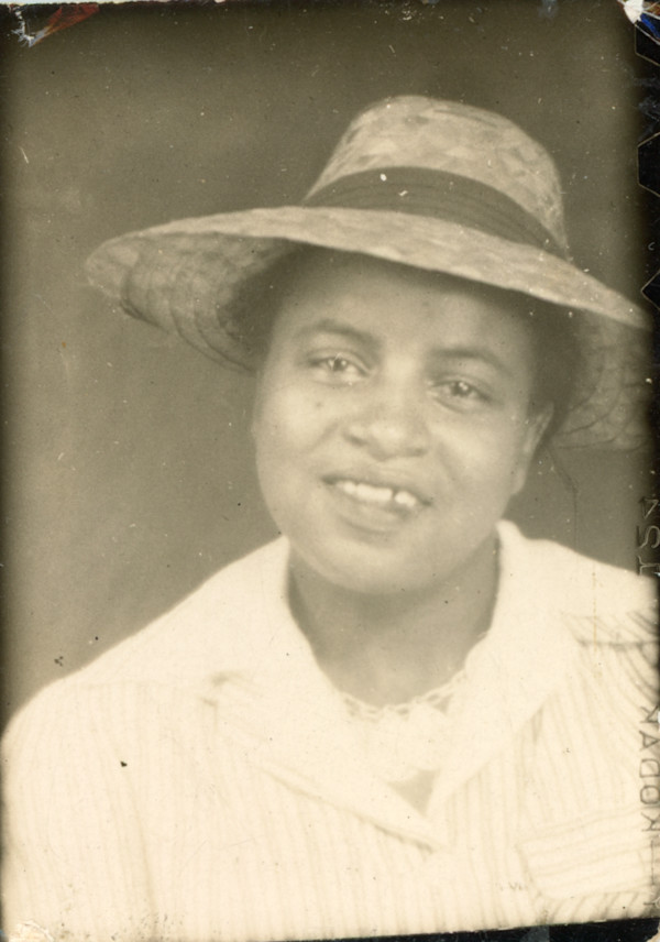 Woman with diastema in straw hat by Unknown