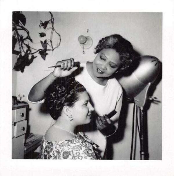 Two women in beauty salon by Unknown